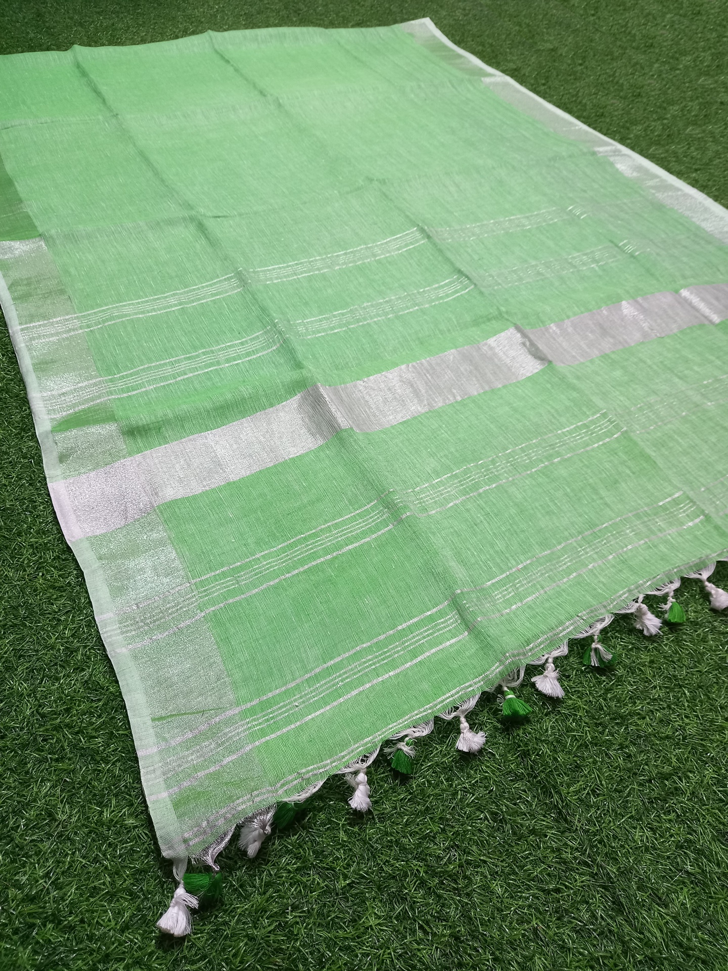 Pale Green Linen Saree with Silver Border