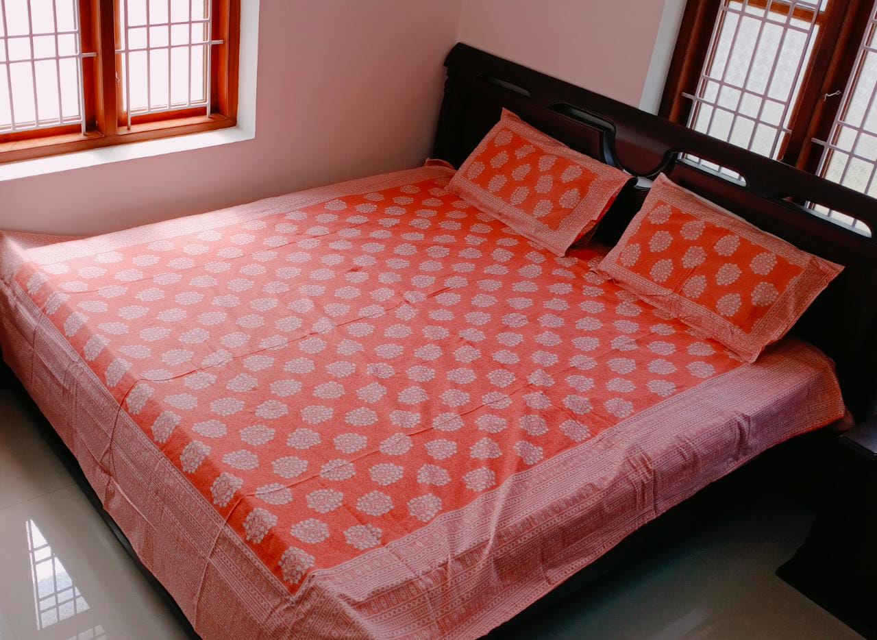 Handloom Cotton block Printed Orange White Bed sheet with pillow covers.