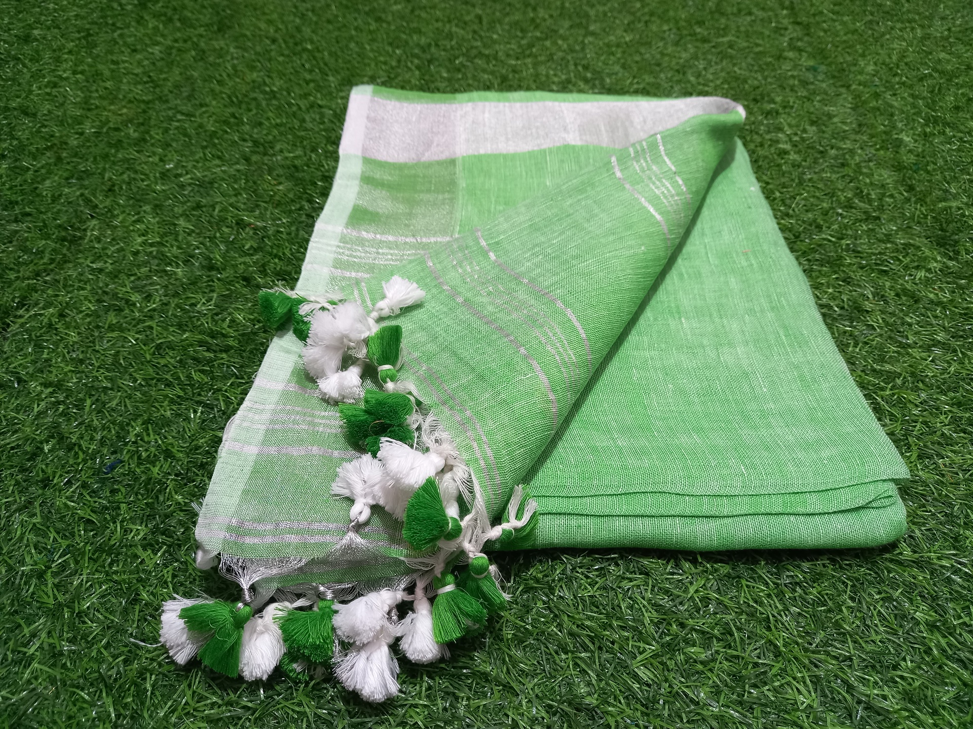Pale Green Linen Saree with Silver Border