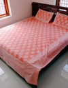 Handloom Cotton block Printed Orange White Bedsheet with pillow covers.